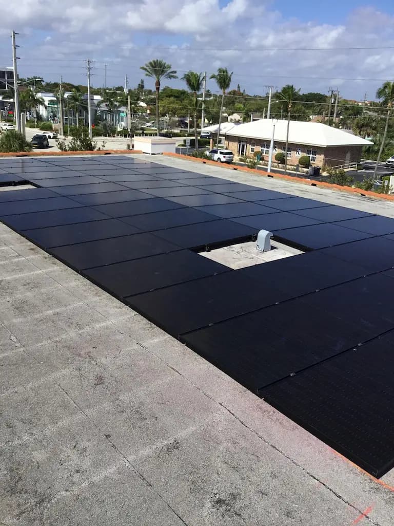 Lunex flat-roof commercial solar system at Locks of Love in Florida.